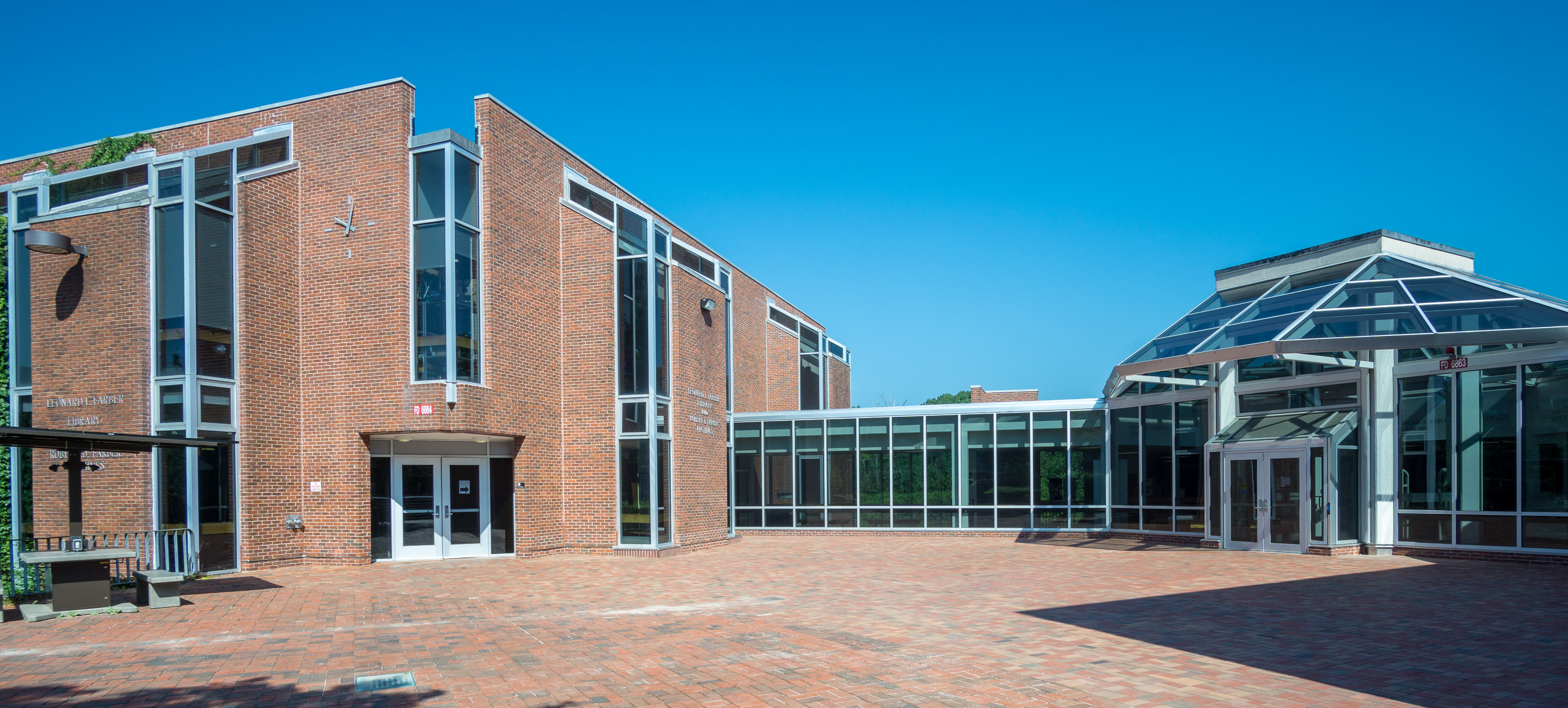 A view of the Goldfarb and Farber Libraries from the main entrance plaza.